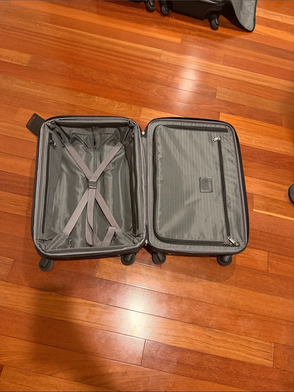 Tumi Black Upright Carry-On with Front Pocket